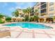 Inviting swimming pool with comfortable lounge chairs at 515 Mirasol Cir # 304, Celebration, FL 34747