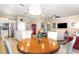 Dining area open to the living room and kitchen, ideal for gatherings at 605 Cantabria Dr, Davenport, FL 33837