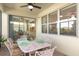 Charming patio with outdoor dining set perfect for enjoying meals outdoors at 605 Cantabria Dr, Davenport, FL 33837