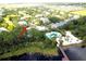 Aerial view showing community pool and lake at 801 New Providence # B19/U801, Davenport, FL 33897