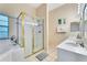 Bathroom boasts a large shower, soaking tub, and double vanity at 801 New Providence # B19/U801, Davenport, FL 33897