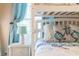 Serene bedroom with a bunk bed and white wicker nightstand at 801 New Providence # B19/U801, Davenport, FL 33897