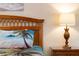 Bedroom with tropical bedding and a pineapple lamp at 801 New Providence # B19/U801, Davenport, FL 33897
