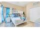 Bedroom with a bunk bed, dresser, and beach themed decor at 801 New Providence # B19/U801, Davenport, FL 33897
