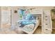 Bright bedroom with a twin-over-twin bunk bed and en-suite bathroom at 801 New Providence # B19/U801, Davenport, FL 33897