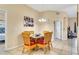 Casual dining area with wicker chairs and a glass top table at 801 New Providence # B19/U801, Davenport, FL 33897