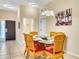 Charming dining area with a table and six chairs at 801 New Providence # B19/U801, Davenport, FL 33897