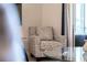 Living room featuring an armchair with a unique pattern at 801 New Providence # B19/U801, Davenport, FL 33897