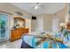 Main bedroom with king bed, dresser, and private access to the patio at 801 New Providence # B19/U801, Davenport, FL 33897