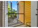 Small patio with a screened enclosure and seating area at 801 New Providence # B19/U801, Davenport, FL 33897