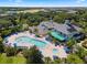 Resort pool and clubhouse with surrounding lounge chairs at 801 New Providence # B19/U801, Davenport, FL 33897