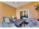 Comfortable screened patio with outdoor seating and dining area at 801 New Providence # B19/U801, Davenport, FL 33897