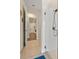 Modern bathroom featuring a glass shower and hallway to other rooms at 8024 Leaf Grove Cir, Orlando, FL 32836