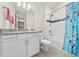 Bathroom with granite countertop, white cabinets, and a shower/tub at 8024 Leaf Grove Cir, Orlando, FL 32836