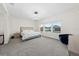 Spacious main bedroom with large windows and modern decor at 8024 Leaf Grove Cir, Orlando, FL 32836