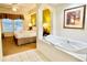 King bedroom with a view and en-suite bathroom at 8100 Poinciana Blvd # 2405, Orlando, FL 32821