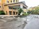 Building exterior showcasing entrance with covered area at 8100 Poinciana Blvd # 2405, Orlando, FL 32821