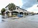 Modern shopping center with ample parking and various stores at 8100 Poinciana Blvd # 2405, Orlando, FL 32821