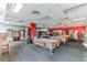 Fun game room featuring pool tables, arcade games, and comfortable seating at 8100 Poinciana Blvd # 2405, Orlando, FL 32821