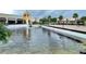 Attractive water fountain and pond area in front of retail buildings at 8100 Poinciana Blvd # 2405, Orlando, FL 32821