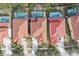 Aerial view of homes with tile roofs and pools at 901 Marcello Blvd, Kissimmee, FL 34746