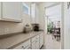 Convenient breakfast bar with additional counter space and cabinets at 901 Marcello Blvd, Kissimmee, FL 34746