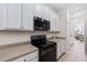 Kitchen with black appliances and ample counter space at 901 Marcello Blvd, Kissimmee, FL 34746
