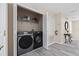 Convenient laundry room with washer and dryer at 901 Marcello Blvd, Kissimmee, FL 34746