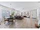 Bright and airy living room with tile floors and a dining area at 901 Marcello Blvd, Kissimmee, FL 34746
