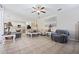 Living room with a comfortable sectional sofa and a view of the kitchen at 901 Marcello Blvd, Kissimmee, FL 34746