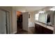 Main bathroom with soaking tub, double vanity and walk-in shower at 1015 Sabine Pl, Kissimmee, FL 34759