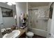 Clean bathroom featuring a shower/tub combo and updated vanity at 1015 Sabine Pl, Kissimmee, FL 34759