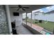 Cozy screened patio overlooking the backyard at 1015 Sabine Pl, Kissimmee, FL 34759