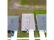 Top-down view of a house and surrounding area at 1057 Cambridge Dr, Winter Haven, FL 33881
