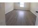 Empty bedroom with gray vinyl plank flooring at 1057 Cambridge Dr, Winter Haven, FL 33881