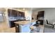 Modern kitchen with granite countertops and stainless steel appliances at 1057 Cambridge Dr, Winter Haven, FL 33881