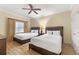 Guest bedroom with two twin-size beds, perfect for overnight guests at 1108 Sunset View Cir # 204, Reunion, FL 34747