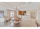 Inviting dining area with stylish chandelier and a view of the kitchen at 1108 Sunset View Cir # 204, Reunion, FL 34747