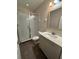 Clean bathroom, includes a shower and updated vanity at 122 Macaulays Cv, Haines City, FL 33844