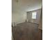 Spacious bedroom with neutral carpeting and ample natural light at 122 Macaulays Cv, Haines City, FL 33844