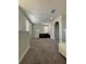 Spacious loft area with carpeted floors and neutral wall colors at 122 Macaulays Cv, Haines City, FL 33844