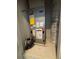 Utility room with HVAC system and water heater at 122 Macaulays Cv, Haines City, FL 33844