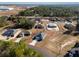 Aerial view showcasing a single-story house on a lot in a residential area at 13404 Sw 60Th Court Rd, Ocala, FL 34473