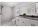 Bathroom with marble shower and modern vanity at 13404 Sw 60Th Court Rd, Ocala, FL 34473