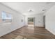Spacious bedroom with patio access and wood-look floors at 13404 Sw 60Th Court Rd, Ocala, FL 34473