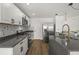 Modern kitchen features stainless steel appliances and a large island at 13404 Sw 60Th Court Rd, Ocala, FL 34473