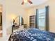 Spacious bedroom with a double bed and built-in shelving at 203 Los Gatos Pl, Poinciana, FL 34759