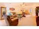 Spacious living room with comfortable seating and neutral decor at 203 Los Gatos Pl, Poinciana, FL 34759