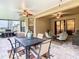Enjoy outdoor dining and lounging in this screened lanai at 203 Los Gatos Pl, Poinciana, FL 34759