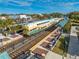 Aerial view of a train station with a SunRail train arriving at the platform at 2211 Jessica Ln, Kissimmee, FL 34744